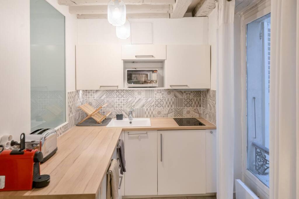 פריז Cosy Appartement En Plein Marais מראה חיצוני תמונה